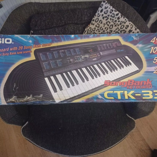 Casio CTK-330 49 Key, 100 Tone, 50 Rhythm Portable Piano Keyboard image 0