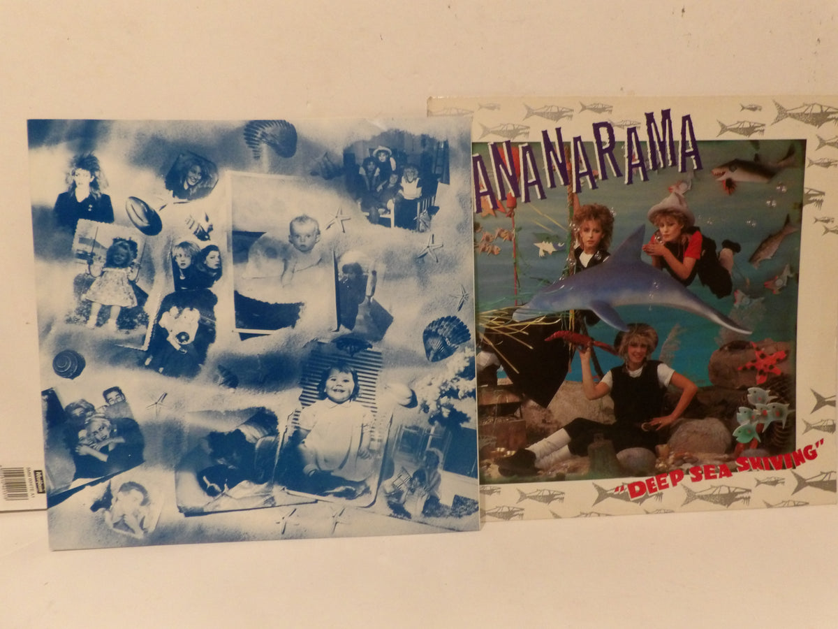 Two square printed items displayed side by side on a light surface. The left item is a blue-toned collage of small photographs and text.