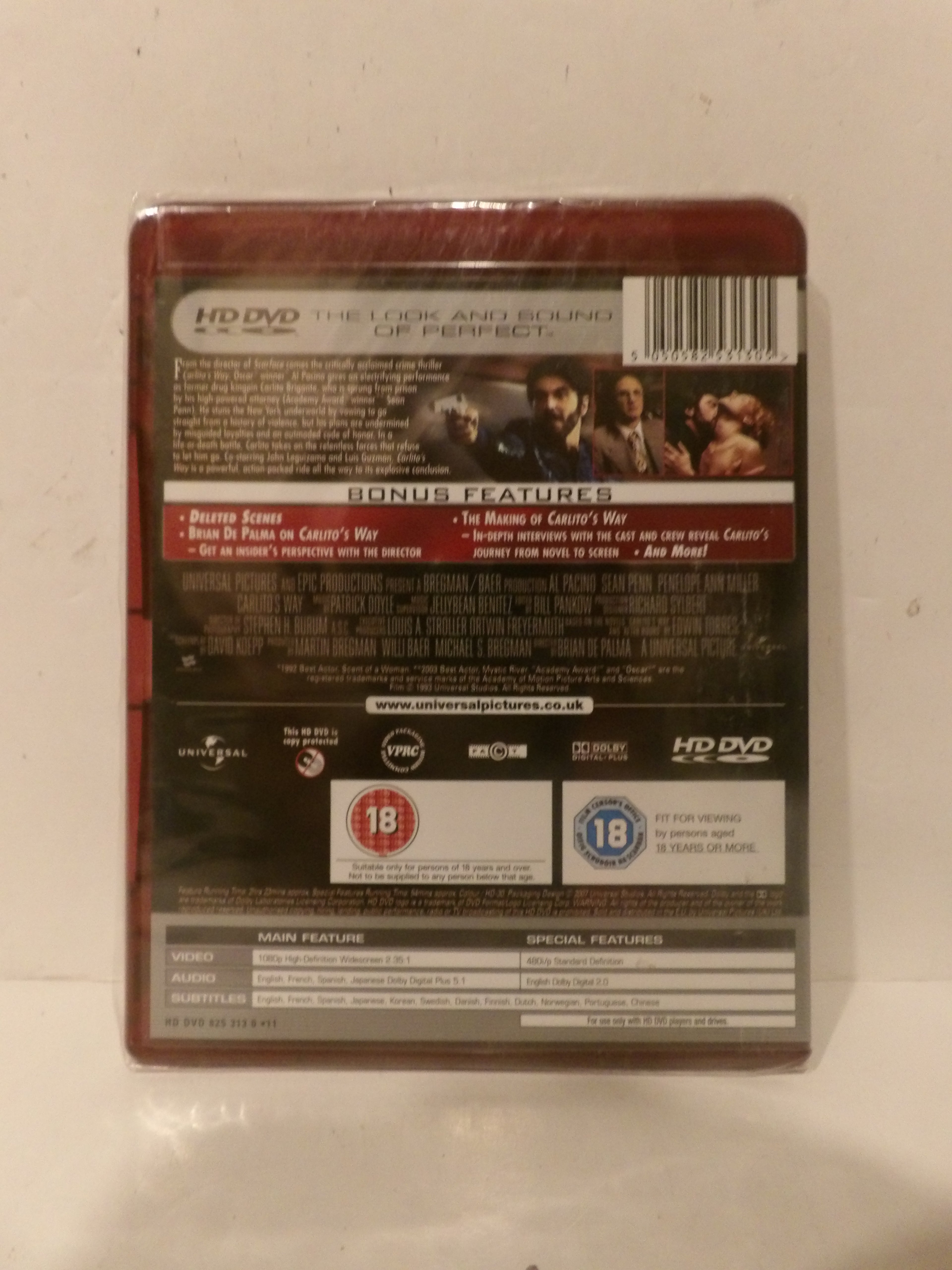 The back cover of a DVD case for the movie 'The Look and Sound of Perfect', showing bonus features, an 18 rating, and barcode information on a light beige background.