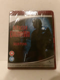 A sealed DVD case of Al Pacino's 'The Godfather: Carlito's Way' featuring Sean Penn, photographed on a light beige surface. The case is wrapped in protective plastic and shows a red spine and a dark cover with red title text.