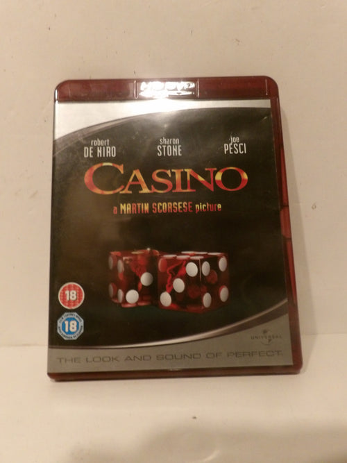 Casino movie Blu-ray case with a dark cover featuring the title in red and gold, plus two red dice with white pips, photographed against a plain off-white background.