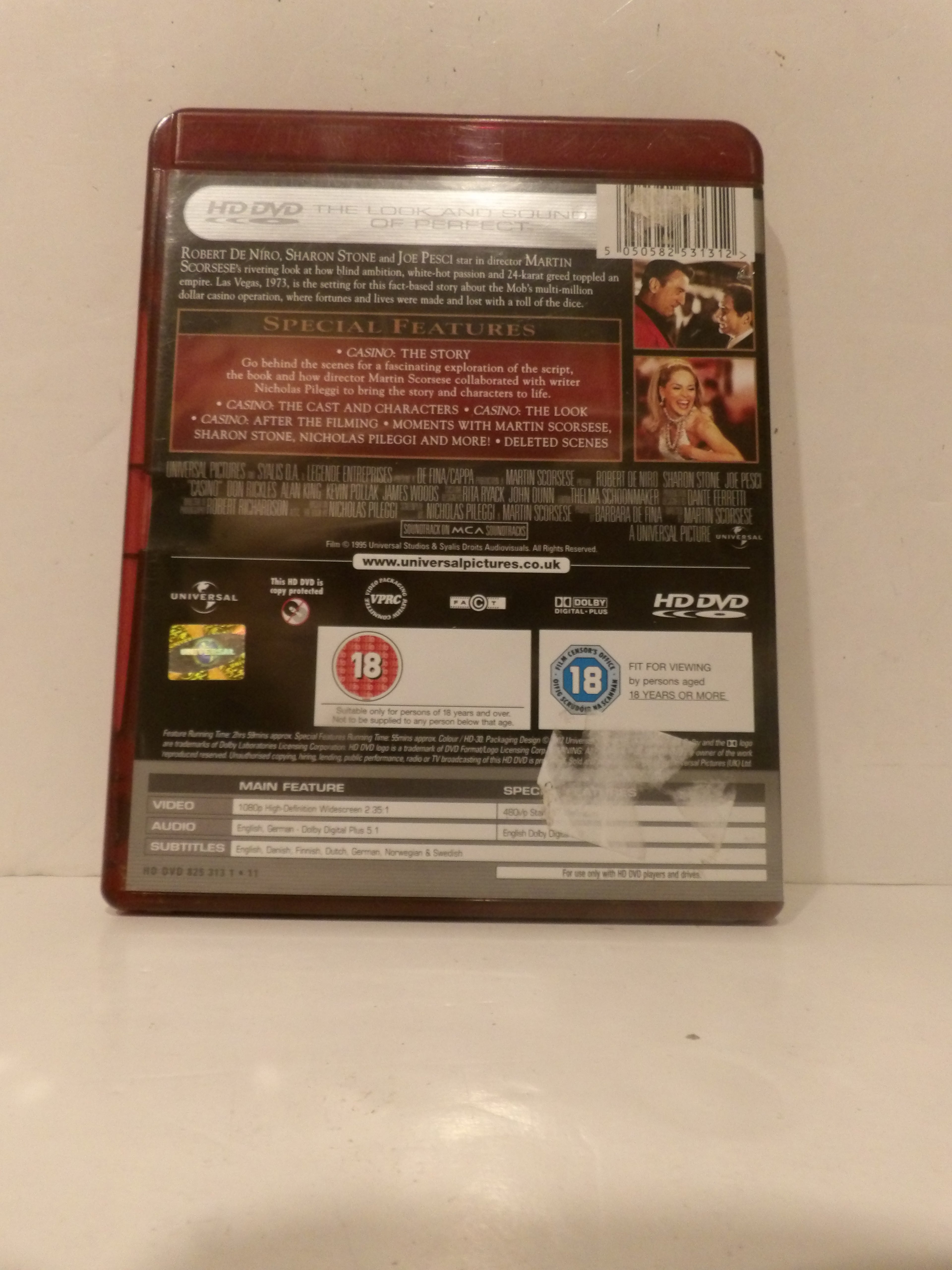 The back cover of a DVD case for the movie 'Carried', showing the title, special features, rating logos, and production company logos on a light-colored surface.