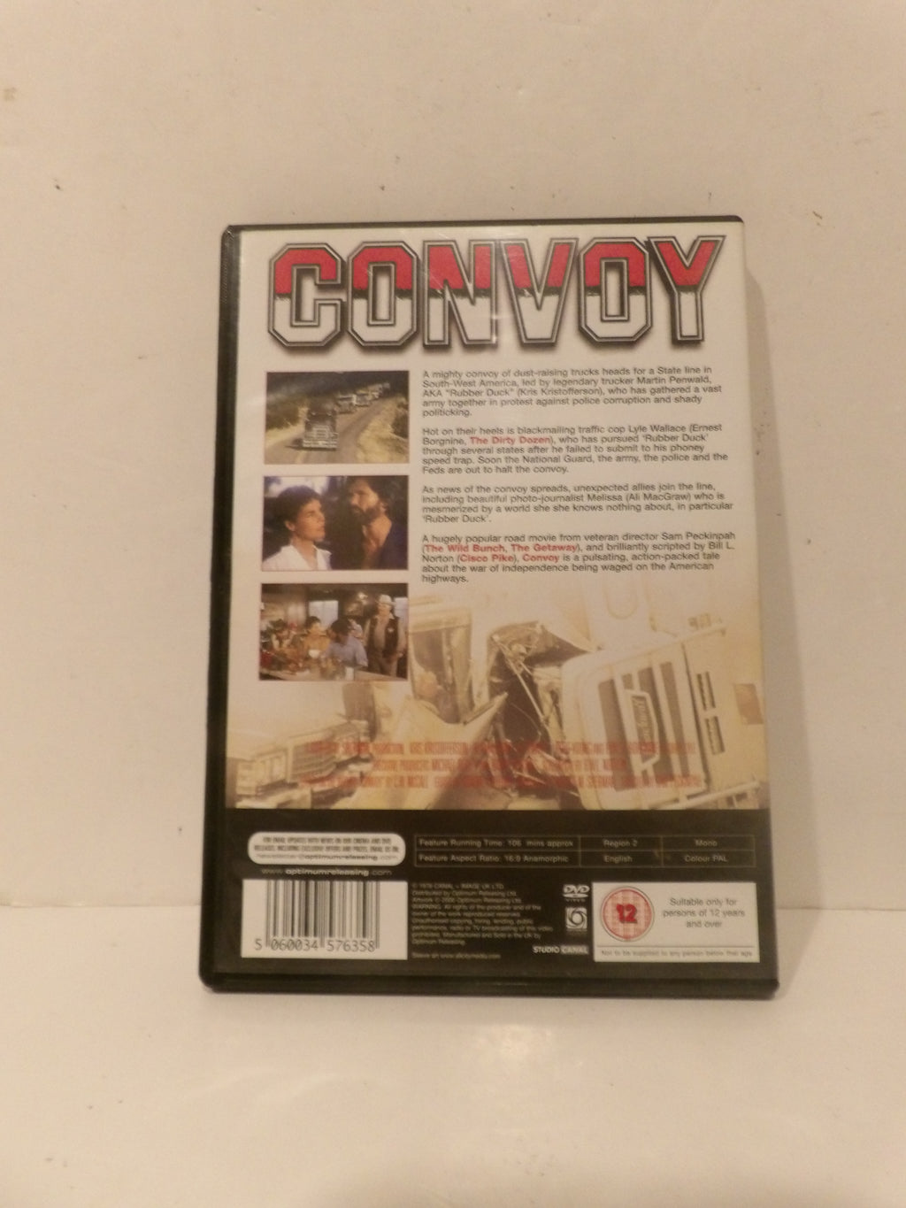 The back cover of a 'Convoy' DVD case, featuring the title in bold red and black letters, with various movie stills and synopsis text on a light beige background.