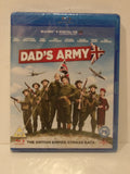 A Blu-ray case for the movie 'Dad's Army' photographed against a plain light background. The case is wrapped in protective plastic and shows the front cover artwork with the title in large red letters, a Union Jack arrow, military uniforms, planes, and a Blu-ray logo at the bottom.