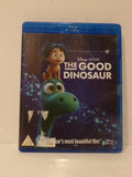 Disney Pixar The Good Dinosaur Blu-ray case on a light beige surface, showing the front cover with Arto the green dinosaur and the title in white text.