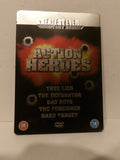DVD cover for the movie 'Action Heroes' featuring a black background with a red and orange explosion graphic, bullet hole details, and a silver metallic top border.