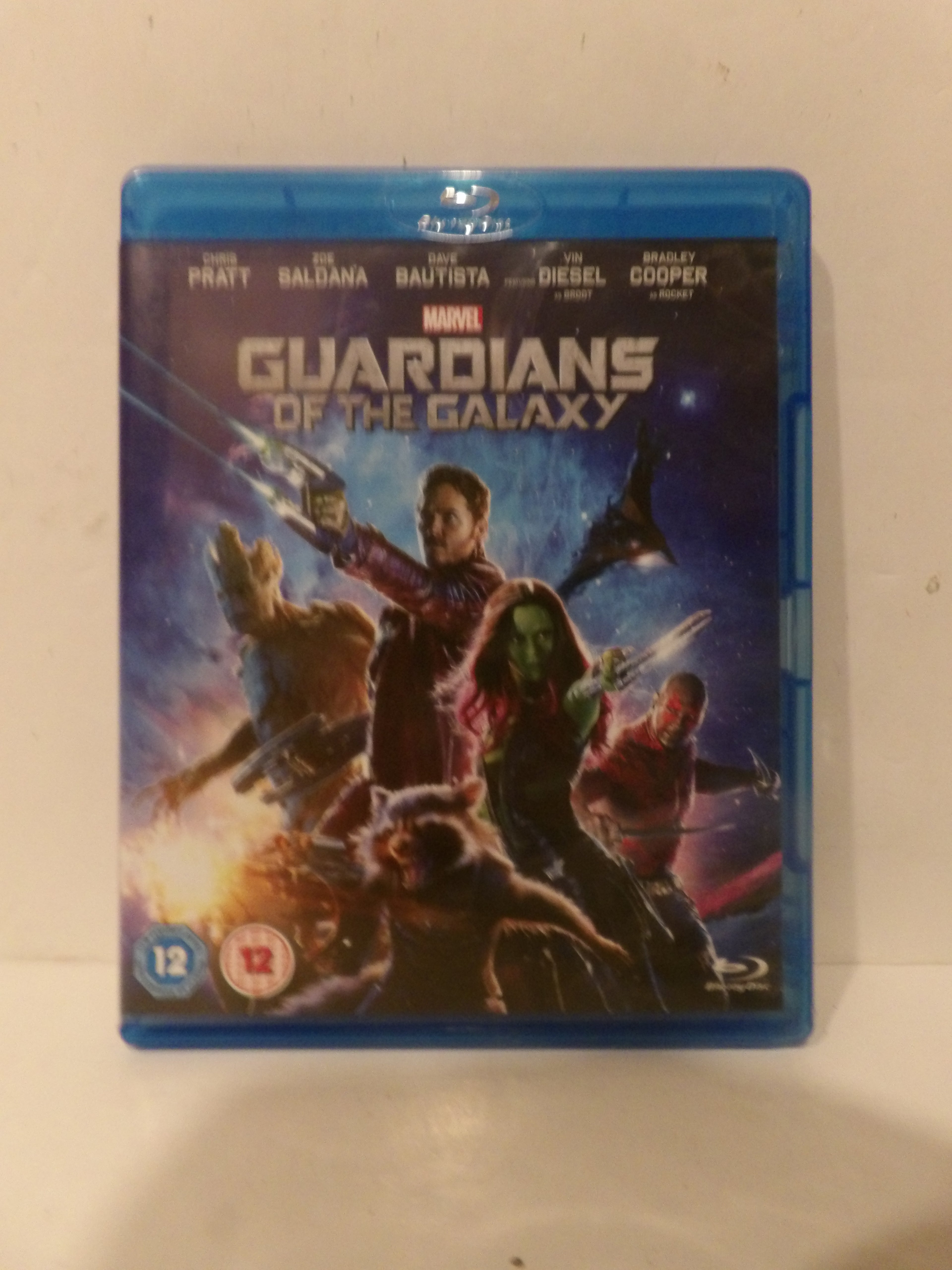 A physical copy of the Marvel Guardians of the Galaxy Blu-ray case, showing the front cover art and blue plastic case on a plain light background.