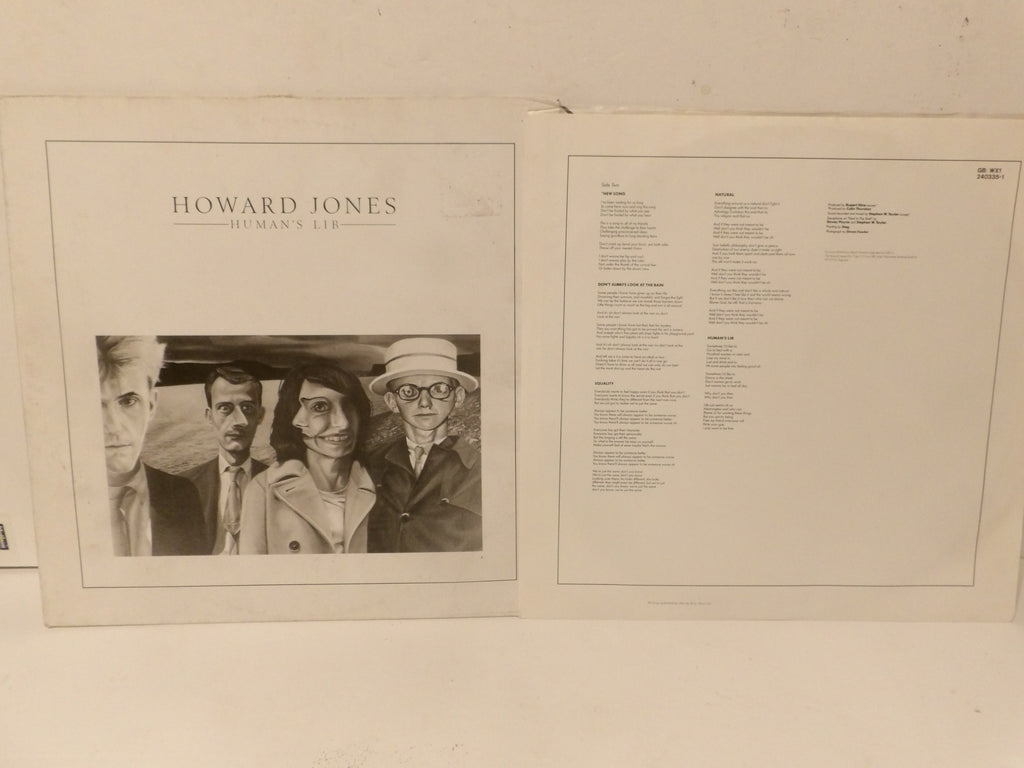 An open book or album volume showing the cover and interior text pages. The left page has the title 'HOWARD JONES' above a black-and-white portrait illustration.