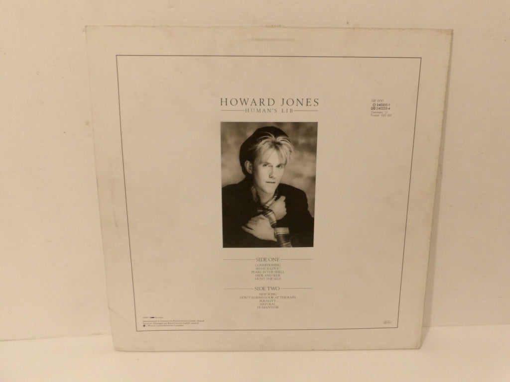 Howard Jones 'Human's Life' vinyl record album cover, showing the back cover with a black and white portrait of the artist and track listing details.