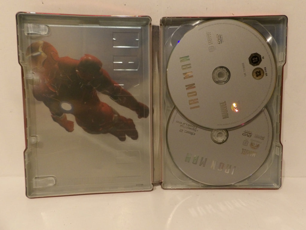 Iron Man 2 movie DVD set in a clear plastic case, showing the left cover with an Iron Man graphic and two silver discs inside.
