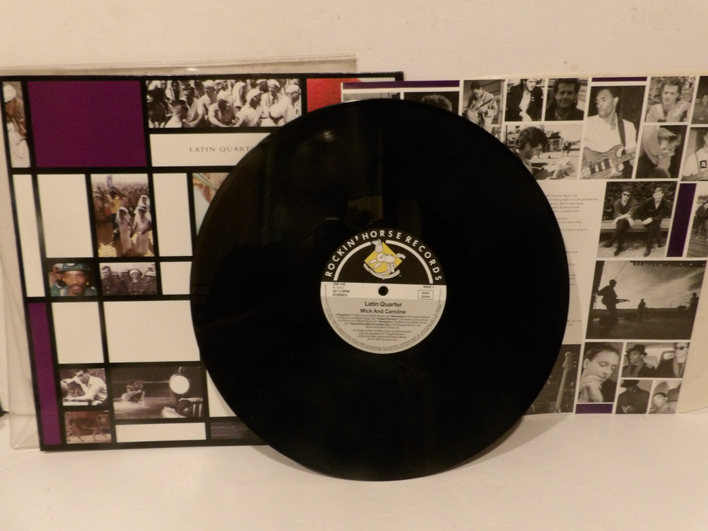 A black vinyl record from Archy Morse Records leaning against its printed sleeve, which features a grid of black-and-white photos and purple blocks.