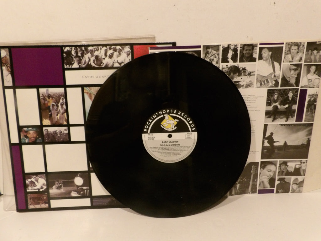 A black vinyl record with a white and gold Documult Records label, displayed in front of its illustrated album cover featuring a grid of black-and-white photos and purple accents.