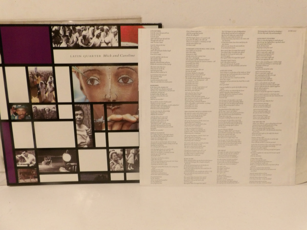 A vinyl record sleeve for Latin Quarter's 'Mid and Above' album, showing the front cover collage on the left and the printed tracklist on the inner sleeve on the right, set against a plain off-white background.