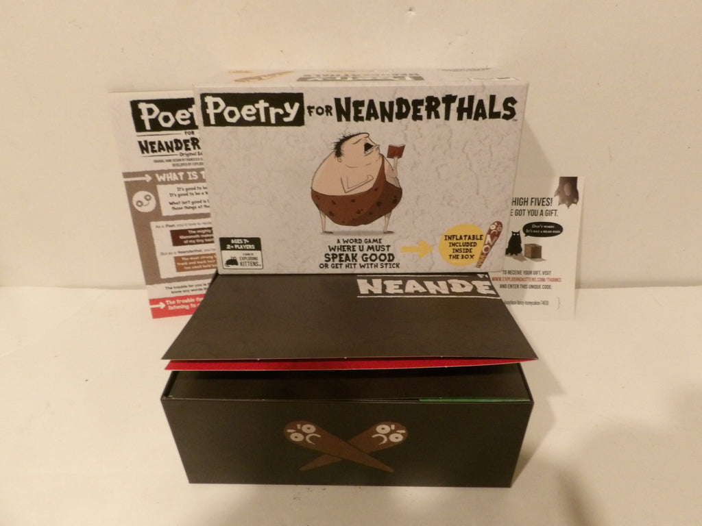 A boxed product labeled 'Poet Poetry for Neandertals' with a black box in front and the printed retail box behind it on a plain light background.