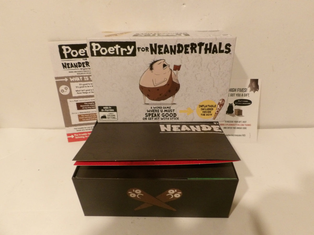 A boxed product labeled 'Poet Poetry for Neandertals' with a black box in front and the printed retail box behind it on a plain light background.