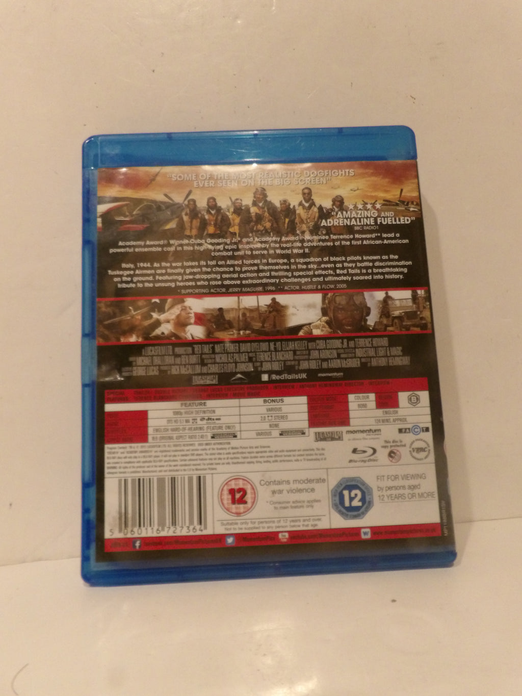 Back cover of a Blu-ray case for the movie '300' resting on a white surface.