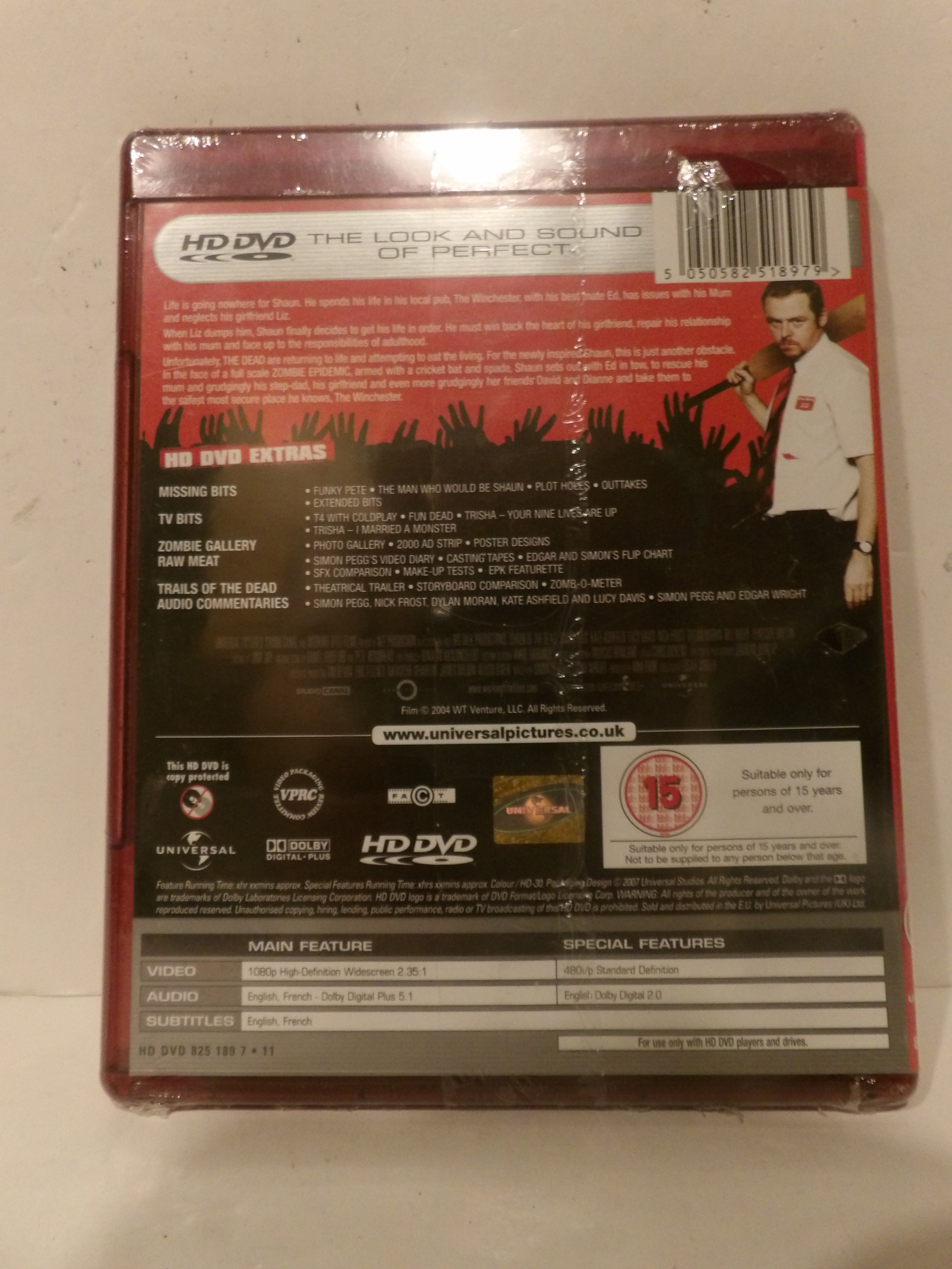 The back cover of a Universal Pictures HD DVD movie case for 'The Look and Sound of Perfume', featuring a red header, barcode, track list, and release details.