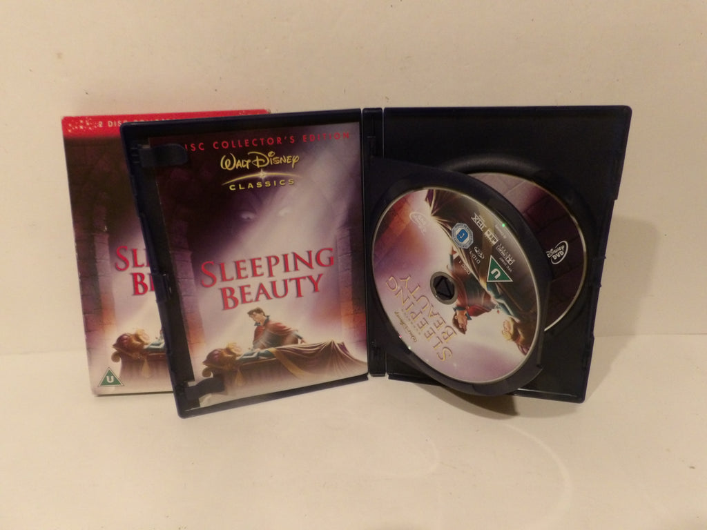 Walt Disney Classics 'Sleeping Beauty' 3-disc collector's edition DVD set, showing the front cover, inner case with two discs, and the outer slipcover on a light beige surface.