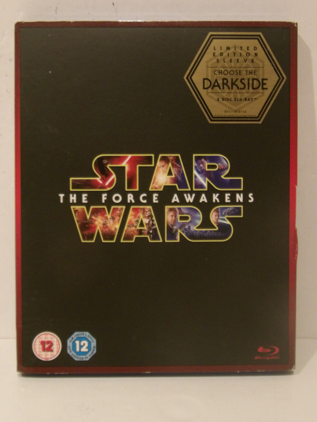 Star Wars: The Force Awakens Limited Edition Darkside Blu-ray case, featuring a black cover with gold and red lettering, a 'Choose the Darkside' hexagonal emblem, and age rating badges.