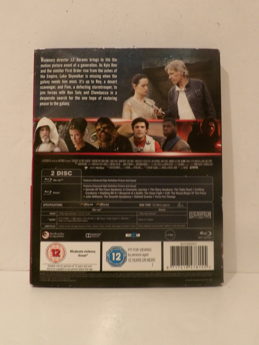 Back cover of a 2-disc Blu-ray movie case, showing cast photos, synopsis text, and product details on a light beige background.
