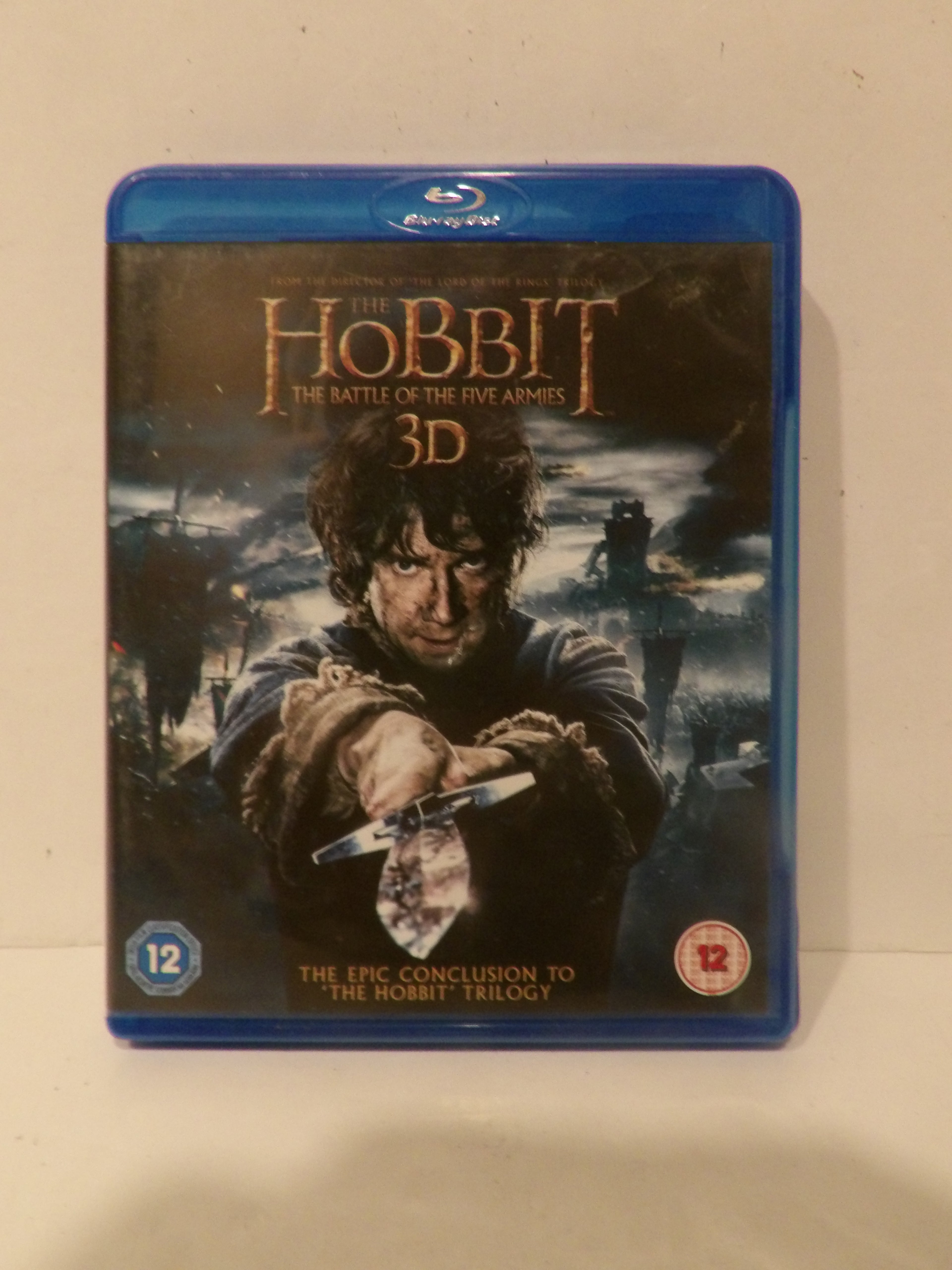 The Hobbit: The Battle of the Five Armies 3D Blu-ray movie case, featuring the blue plastic case with the movie cover art showing Bilbo holding a sword.
