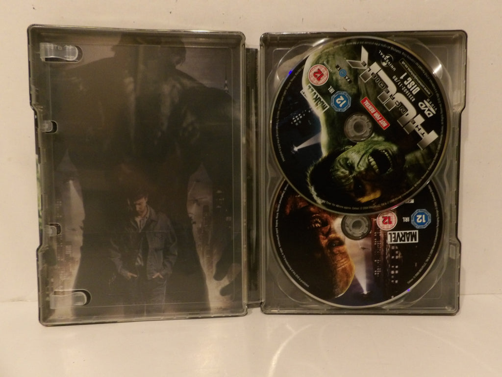 A boxed DVD movie case shown open, with the left side featuring a dark illustrated cover and the right side holding two DVDs. Visible text includes Marvel and The Incredible Hulk.