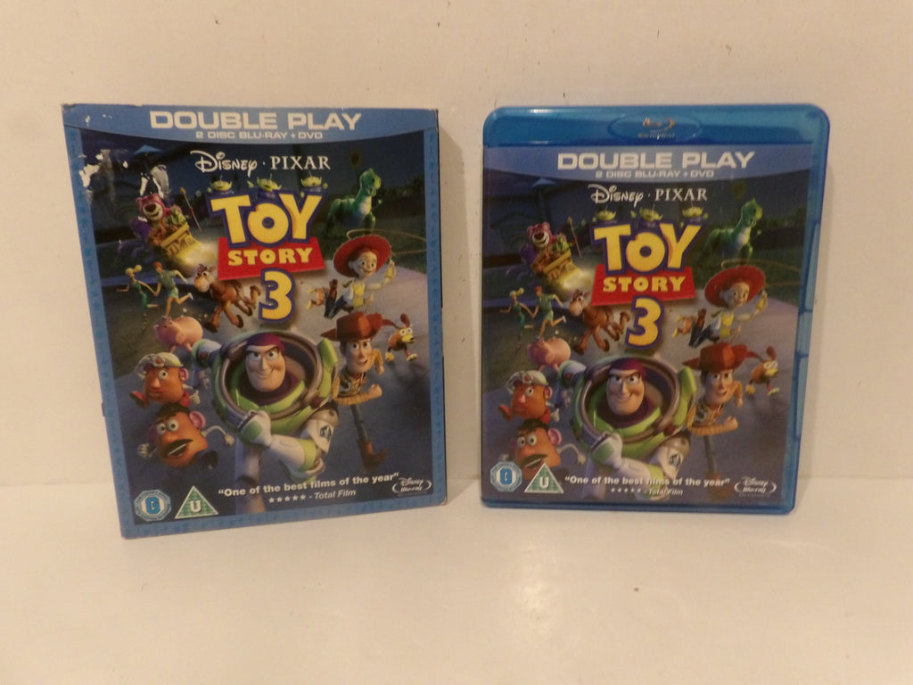 Two Disney Pixar Toy Story 3 double play Blu-ray cases standing upright on a white surface, one showing the front cover and the other showing the Blu-ray case side with the cover partially visible.