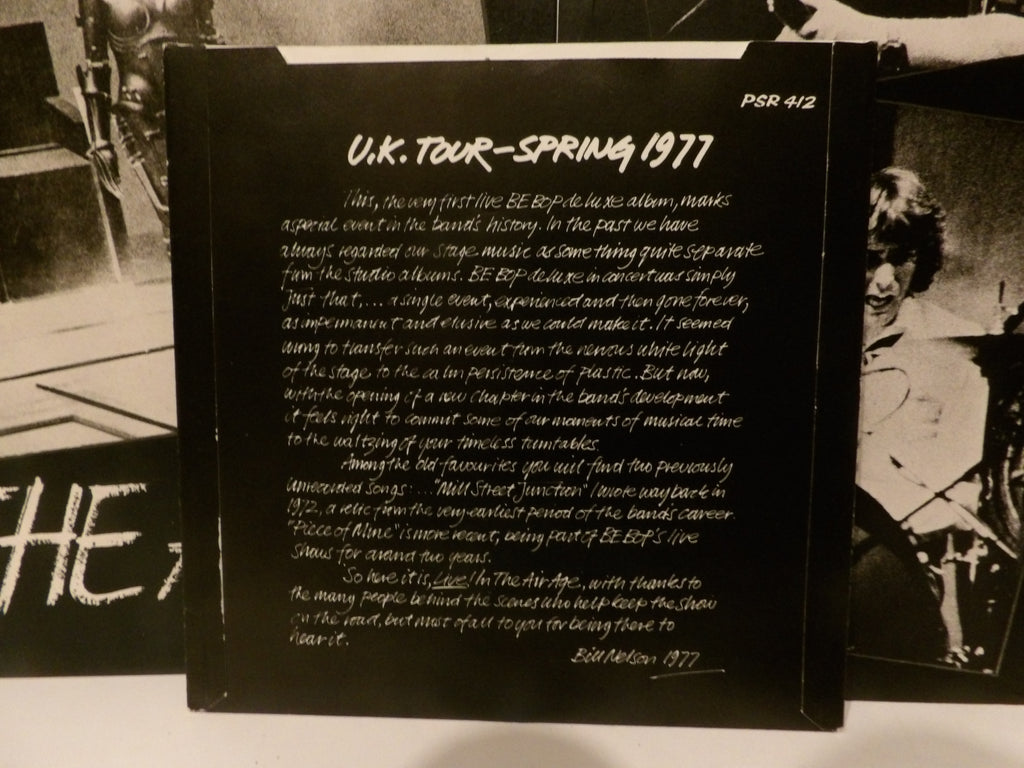 A black printed booklet or album insert with white text reading 'U.S.