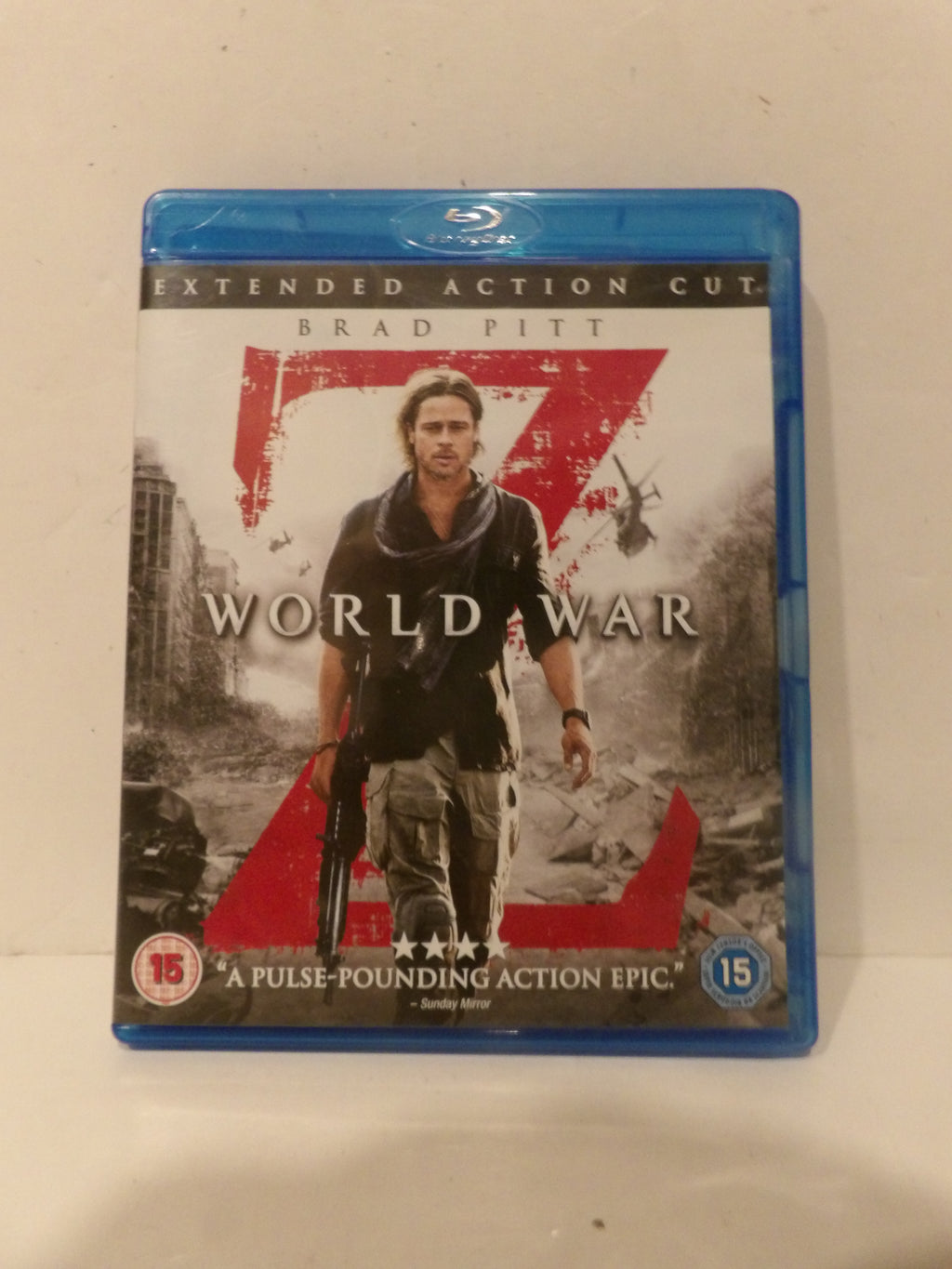 A Blu-ray case for the movie World War Z, featuring Brad Pitt on the cover, photographed against a plain off-white background.