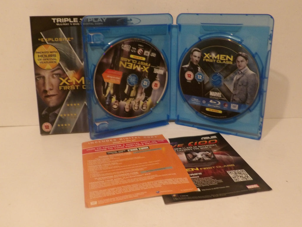 X-Men: First Class Blu-ray 3-disc set with the blue plastic case open to show two discs, the front cover insert, and two paper inserts on a white surface.